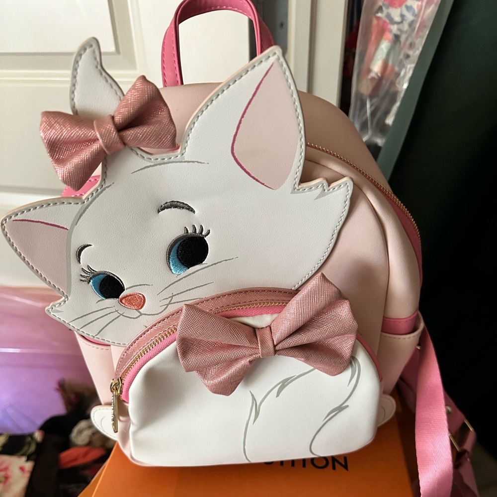Loungefly Sassy Marie backpack and matching wallet